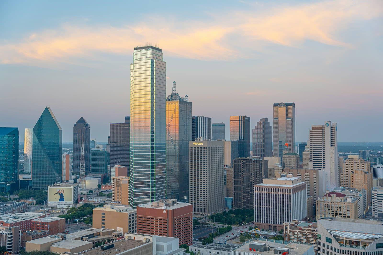 Downtown Dallas skyscrapers in warm sunset light